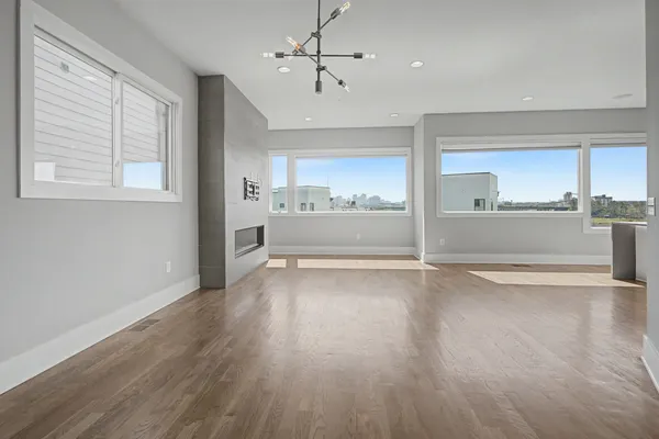 a view of an empty room and window