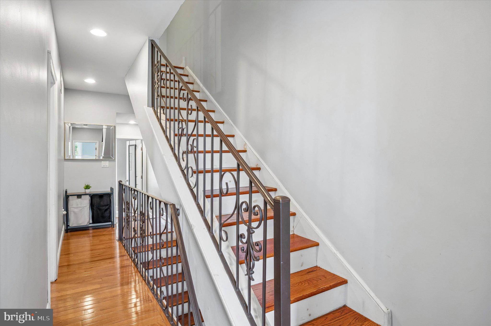 516 High Street Philadelphia, PA 19144 - Photo 20 of 31 Elegant staircase with modern charm.