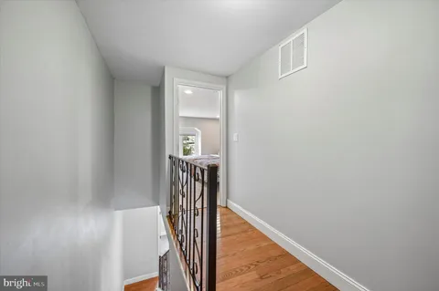 a picture of a bench in a white building