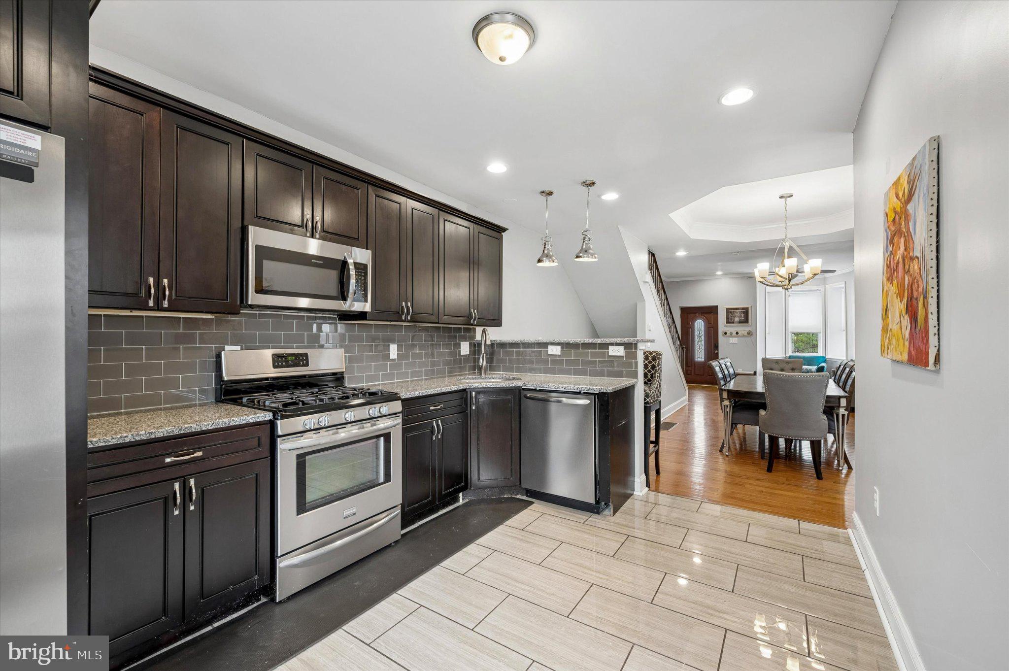 516 High Street Philadelphia, PA 19144 - Photo 10 of 31 Modern kitchen with sleek finishes.