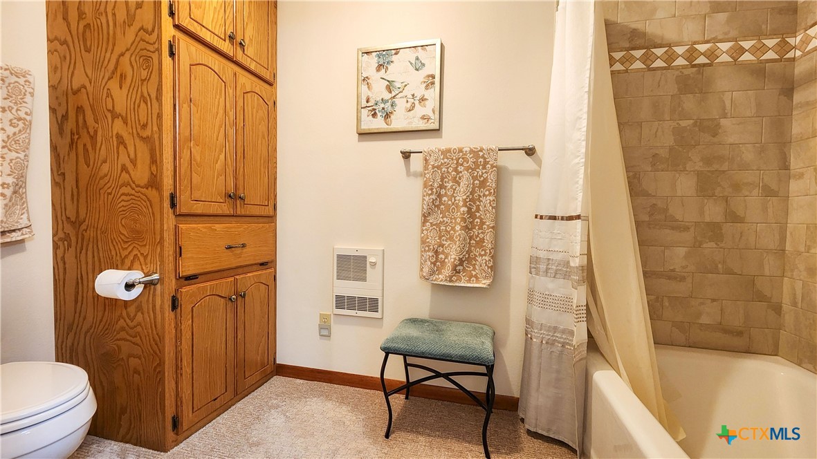 847 Oliver Road Victoria, TX 77904 - Photo 21 of 47 a bathroom with a shower curtain and a sink