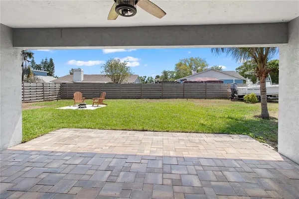 a view of a backyard with a garden and plants