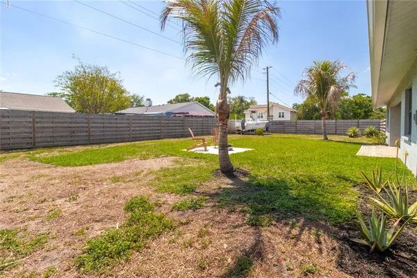 a view of a backyard with a garden
