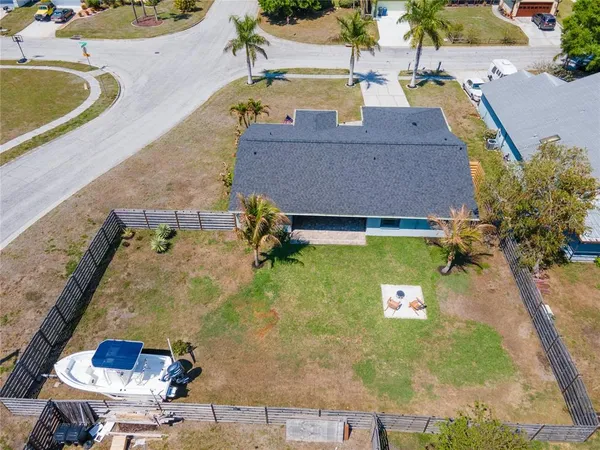 an aerial view of a house with swimming pool