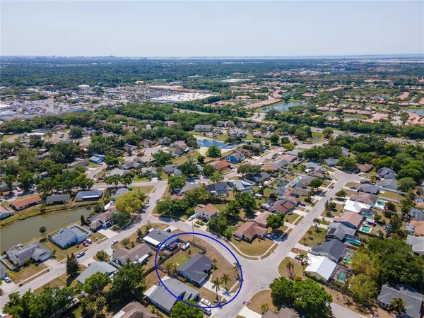 an aerial view of a city with lots of residential buildings