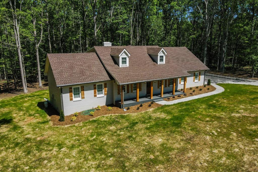 2010 Gratis Road Monroe, GA 30656 - Photo 1 of 1 a aerial view of a house with swimming pool and sitting area