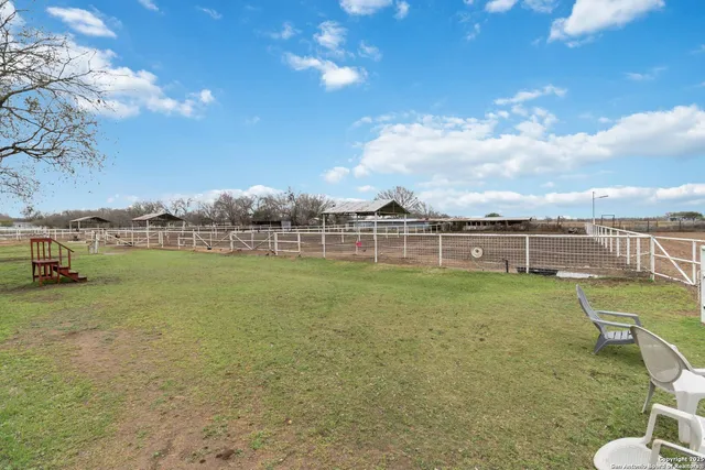 a view of a golf course with a lake