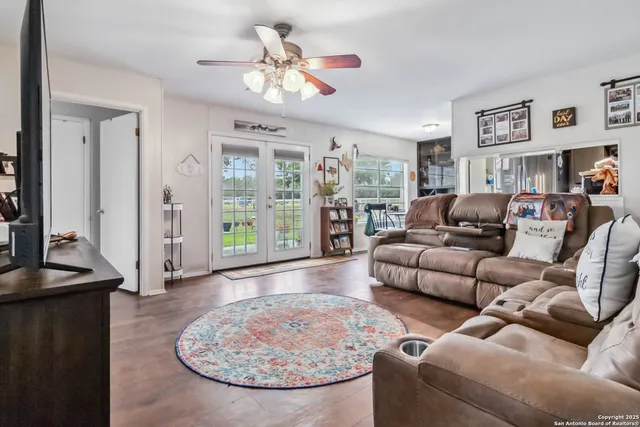 a kitchen with stainless steel appliances granite countertop a stove and a sink