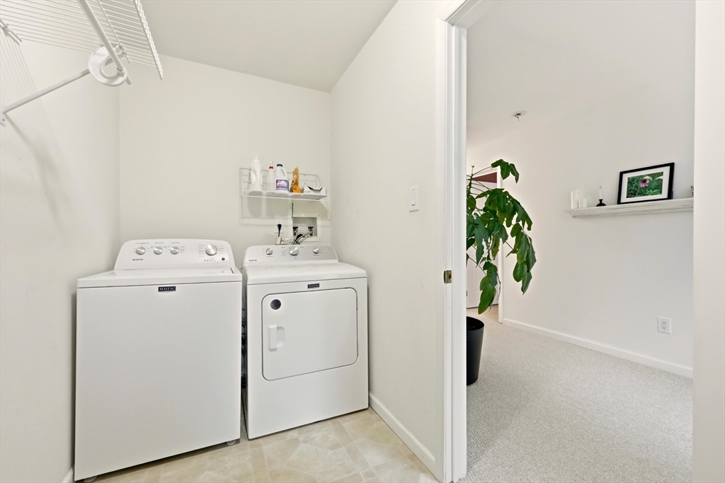 175 Leonard Street, Unit 2 Raynham, MA 02767 - Photo 23 of 27 a utility room with dryer and washer