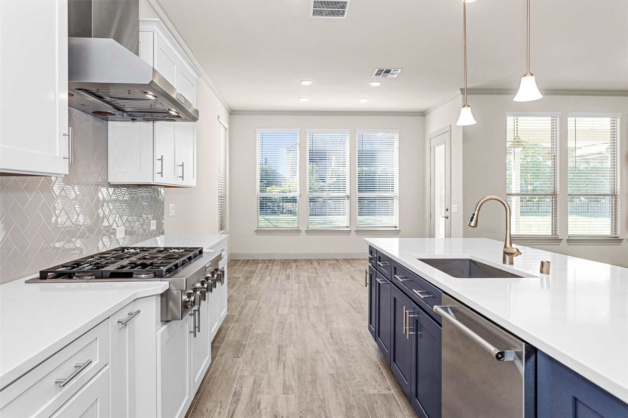 209 Fox Trotter Spring, TX 77382 - Photo 13 of 33 The dining area offers easy access to the kitchen, a covered patio through the back door, and is bathed in natural light.