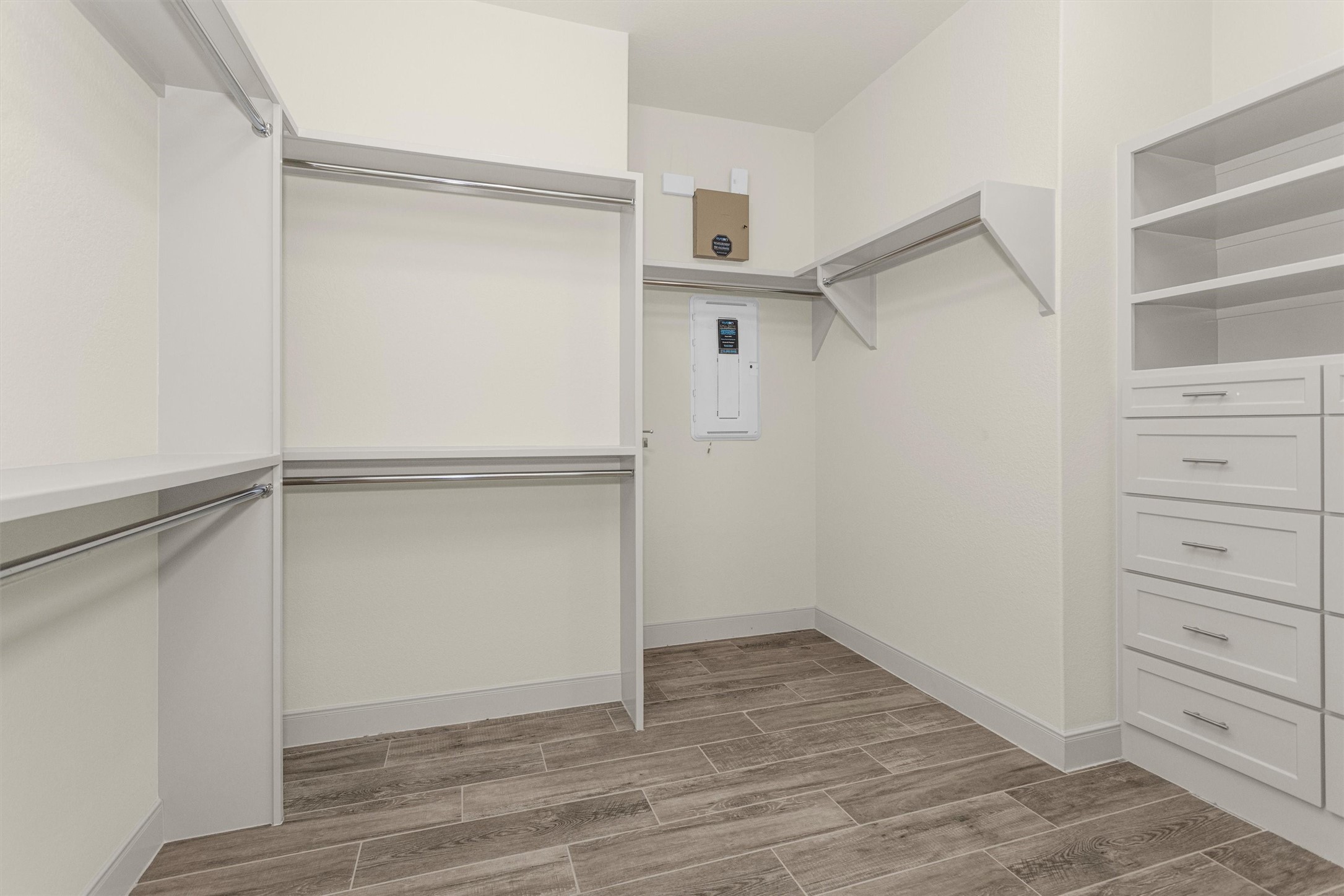 209 Fox Trotter Spring, TX 77382 - Photo 23 of 33 Spacious owner's closet with ample built-in storage.