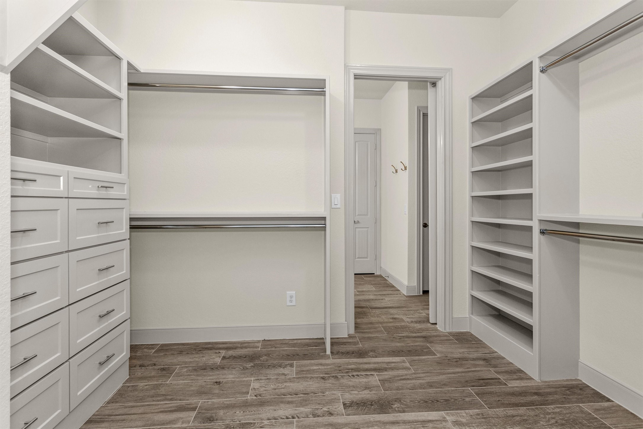 209 Fox Trotter Spring, TX 77382 - Photo 24 of 33 Discover seamless organization in the custom-designed owner's closet.