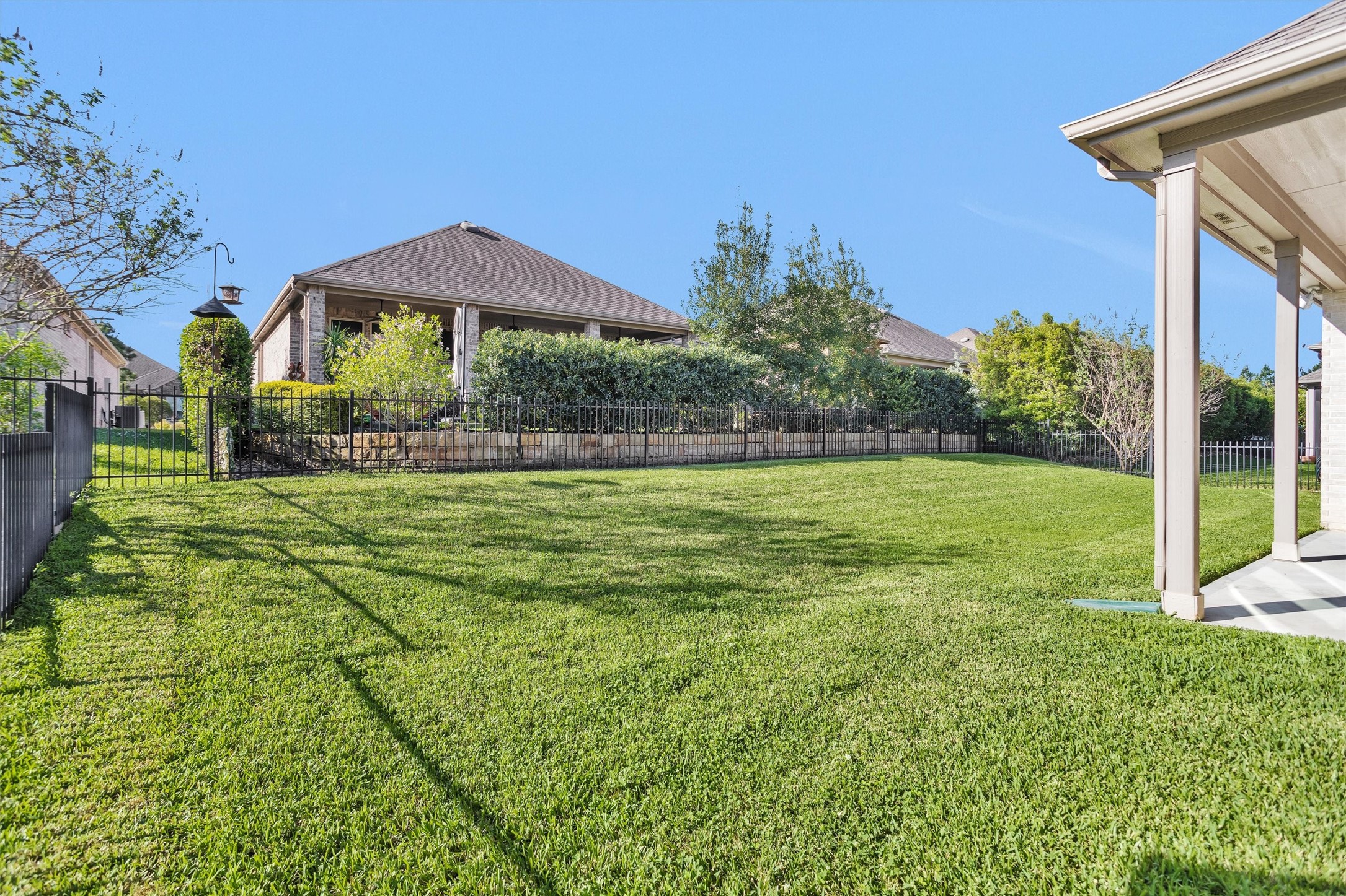 209 Fox Trotter Spring, TX 77382 - Photo 30 of 33 Enjoy enhanced privacy with lush, mature landscaping.