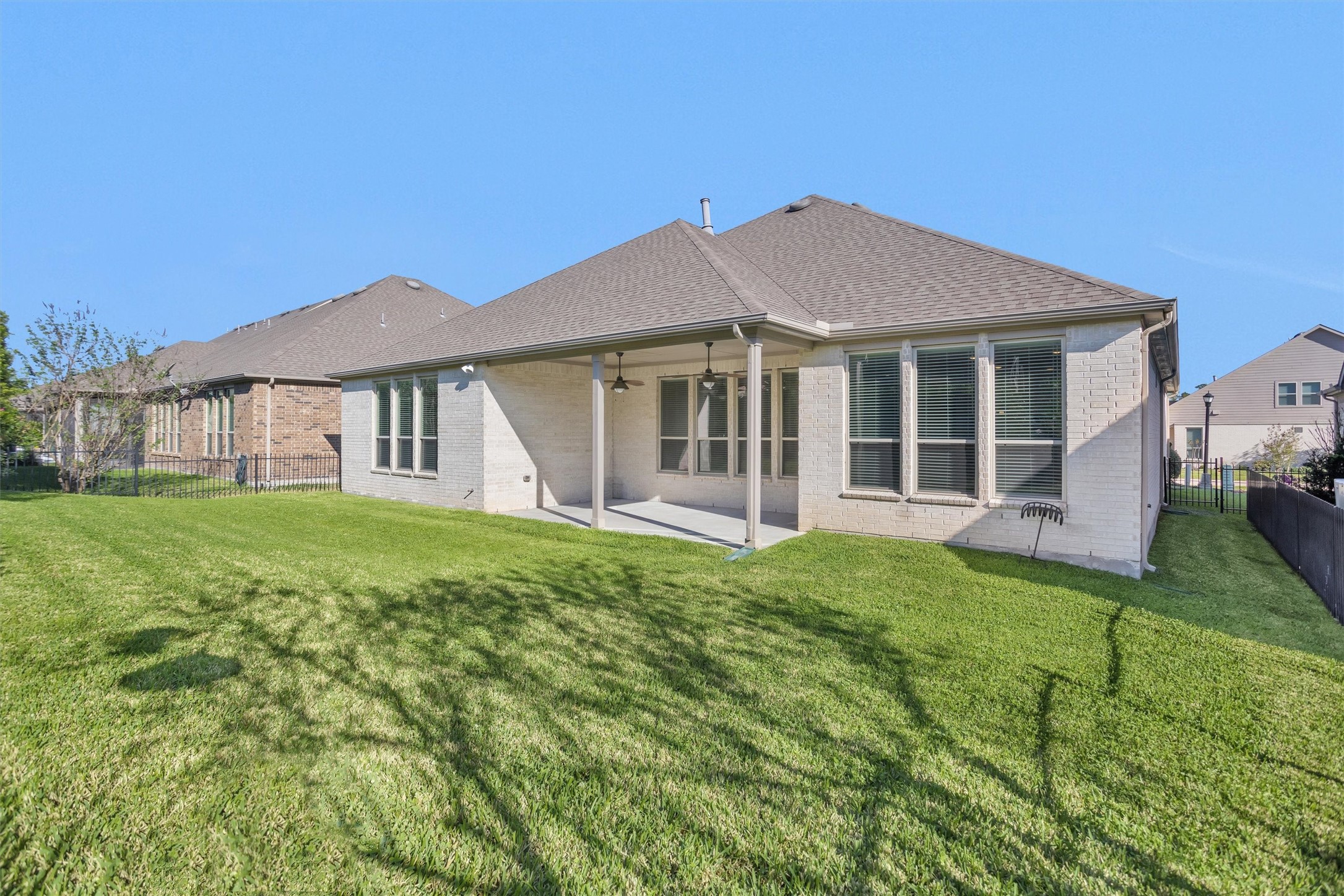 209 Fox Trotter Spring, TX 77382 - Photo 32 of 33 This charming home features a durable all-brick exterior, offering timeless appeal and low maintenance.