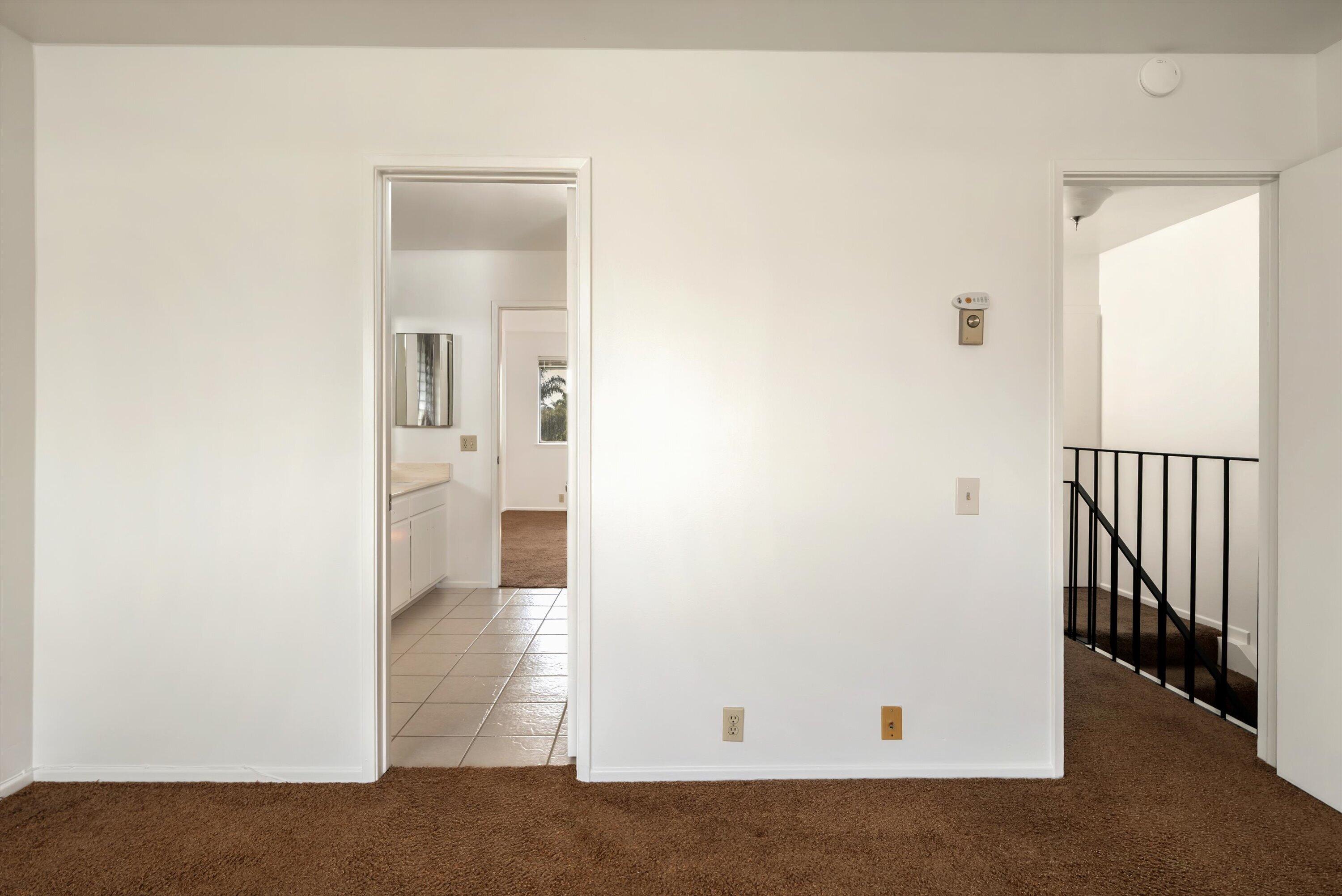 475 Linfield Place Goleta, CA 93117 - Photo 15 of 25 a view of a hallway with wooden floor