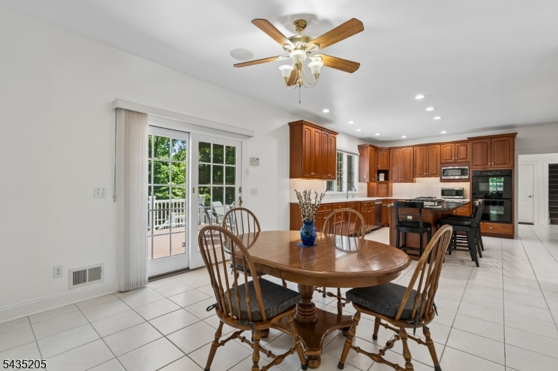 12 Oak Hill Road Bernards, NJ 07920 - Photo 9 of 33 a view of a dining room with furniture