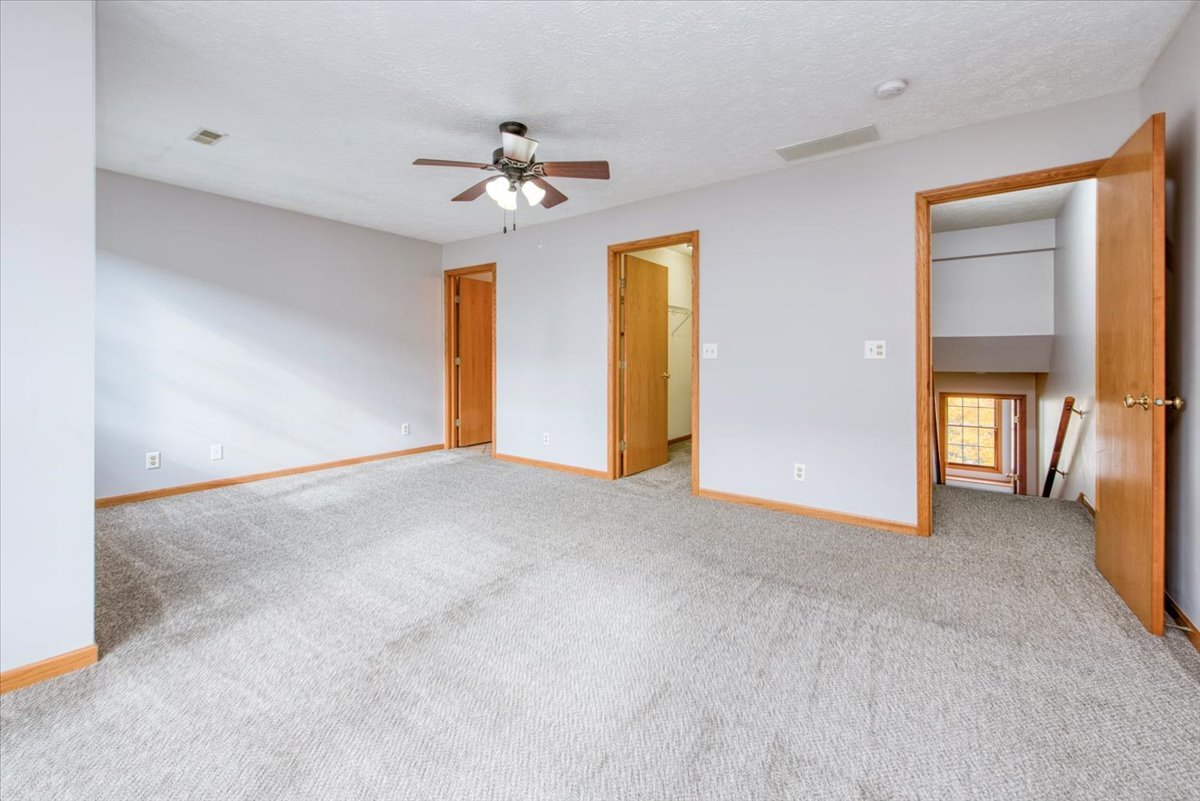 480 South Peace Road Sycamore, IL 60178 - Photo 16 of 22 a view of a livingroom with a chandelier fan
