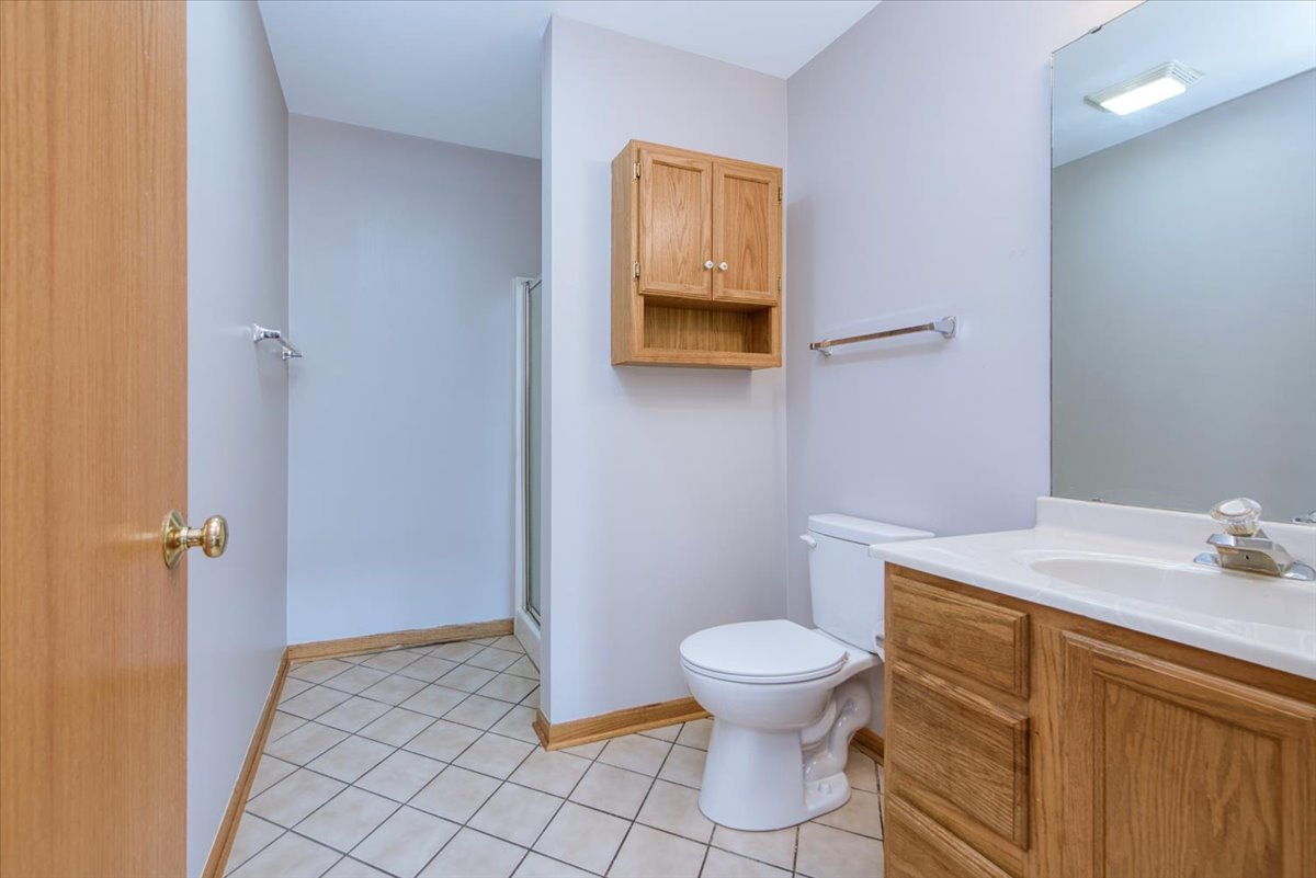 480 South Peace Road Sycamore, IL 60178 - Photo 17 of 22 a bathroom with a sink toilet and vanity