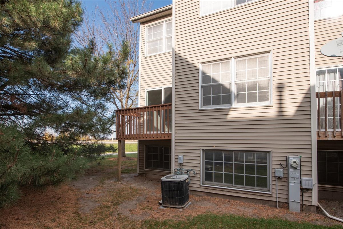 480 South Peace Road Sycamore, IL 60178 - Photo 22 of 22 a view of a house with a yard and a large tree