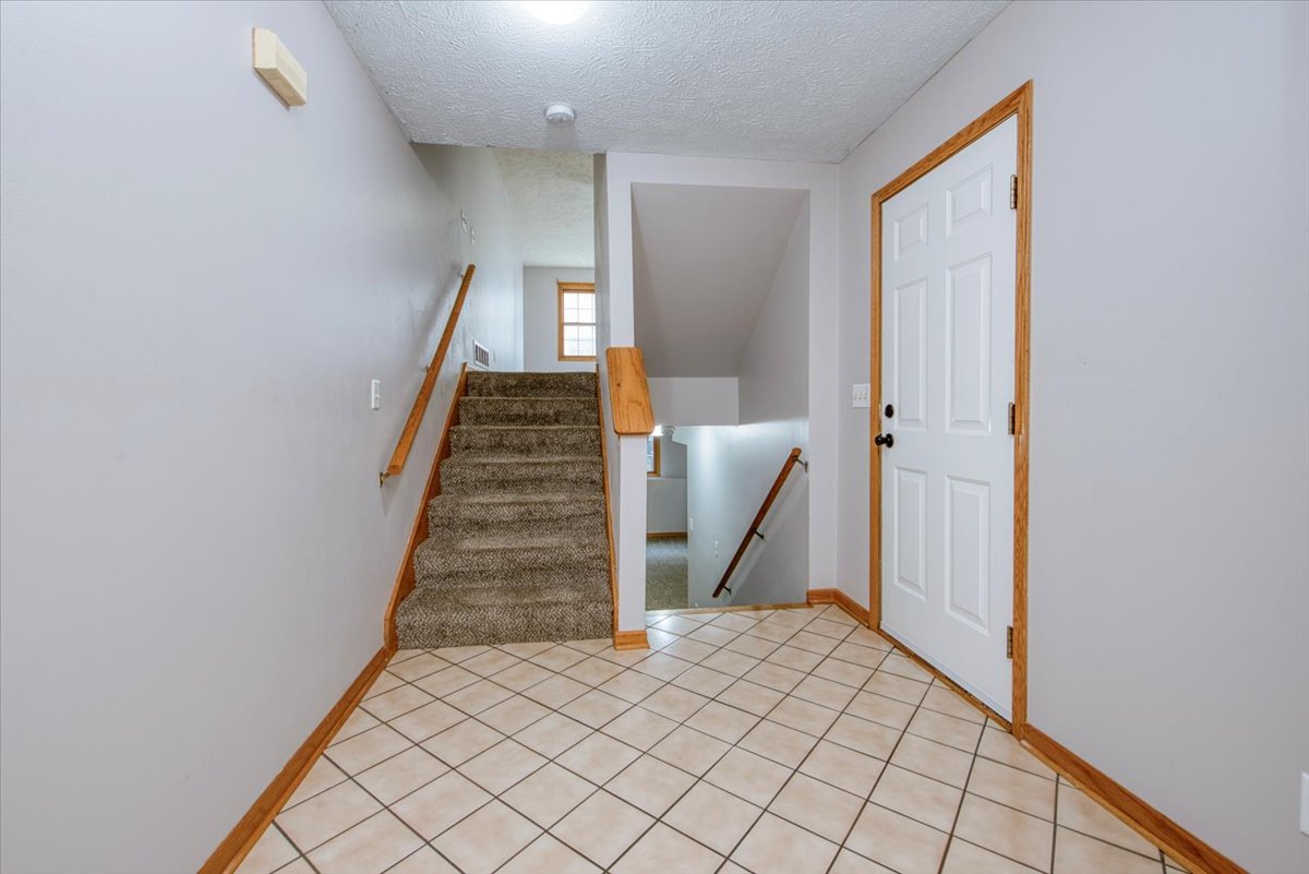 480 South Peace Road Sycamore, IL 60178 - Photo 3 of 22 a view of an entryway with staircase