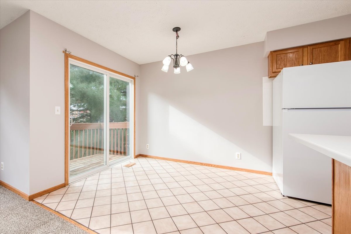 480 South Peace Road Sycamore, IL 60178 - Photo 7 of 22 a view of an empty room with a window