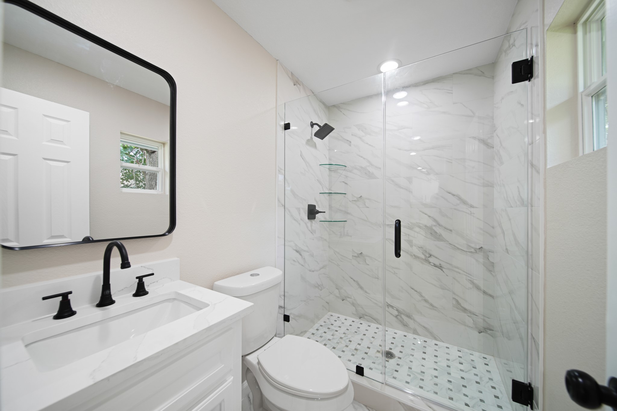 220 Pine Road Clear Lake Shores, TX 77565 - Photo 25 of 31 a bathroom with a sink toilet and shower