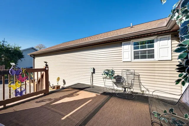 a backyard of a house with seating space
