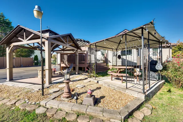 a view of a swimming pool with a patio