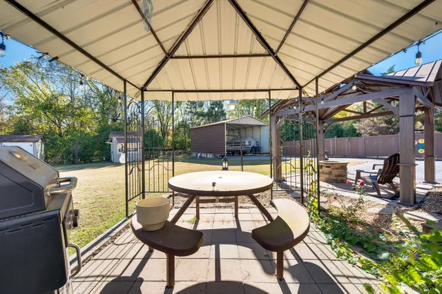 a house view with a outdoor space