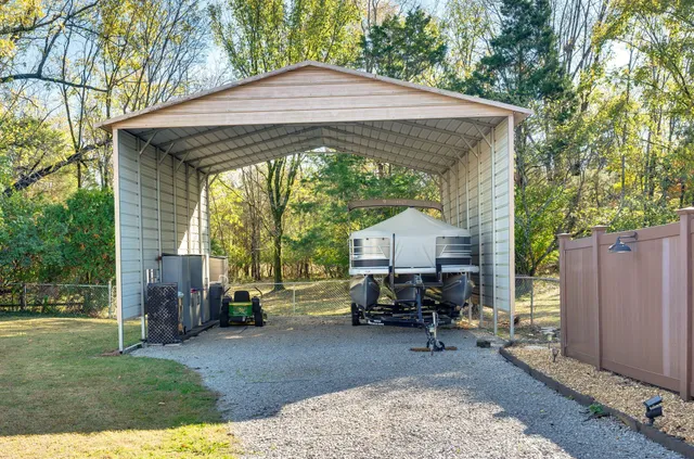 a view of balcony with yard