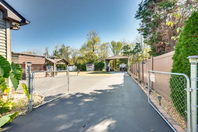a view of house with yard