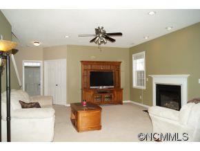 334 Wildbriar Road Fletcher, NC 28732 - Photo 2 of 20 a living room with furniture and a fireplace