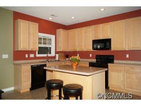 334 Wildbriar Road Fletcher, NC 28732 - Photo 4 of 20 a kitchen with a sink cabinets and window