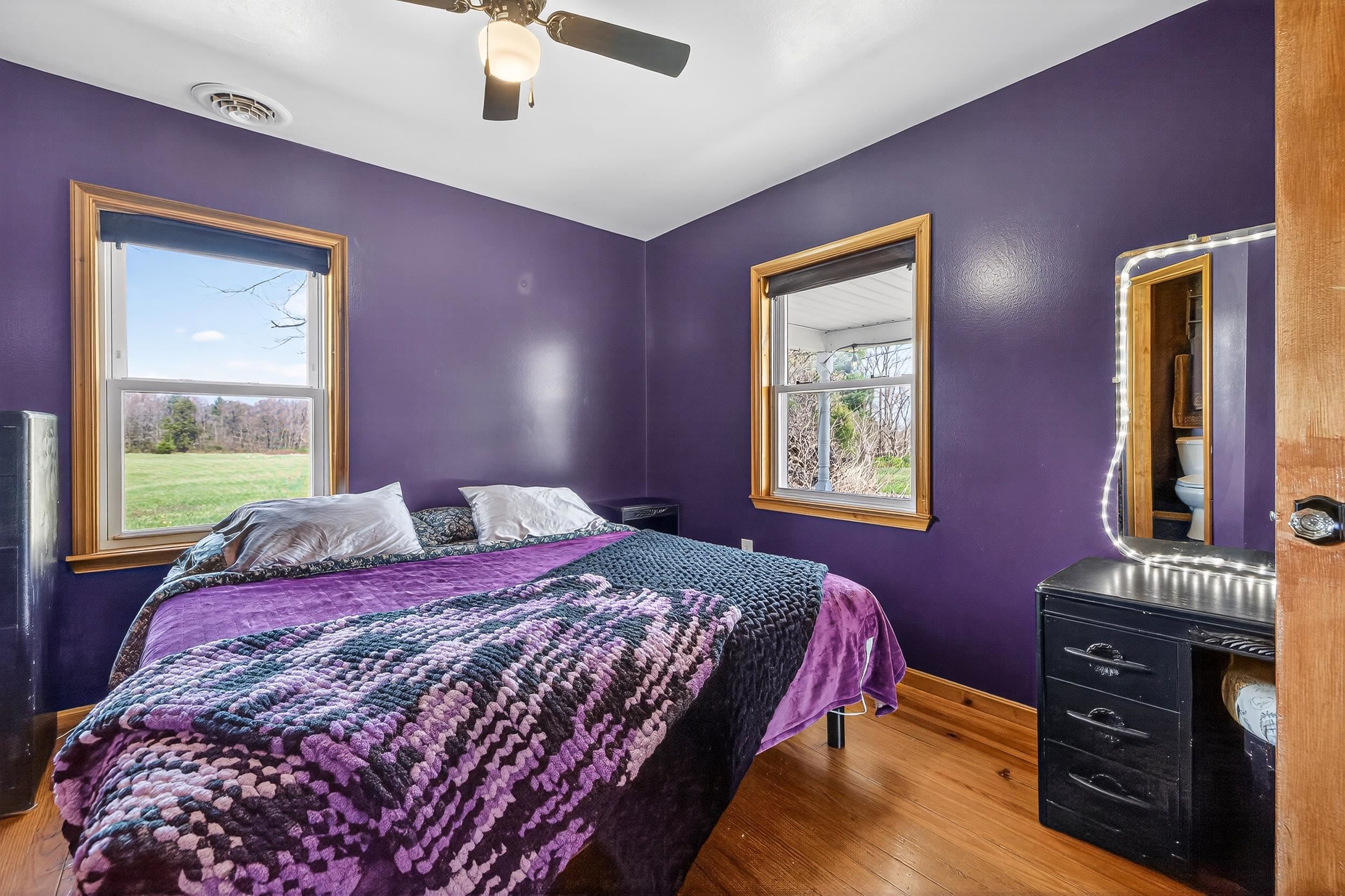 296 Keystone Road Stanley, VA 22851 - Photo 20 of 54 a bedroom with a bed and a dresser next to a window