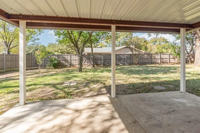 a view of a room with an outdoor space and swimming pool