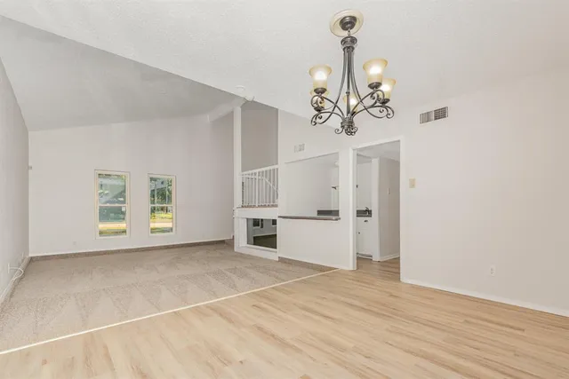 a view of a livingroom with a chandelier