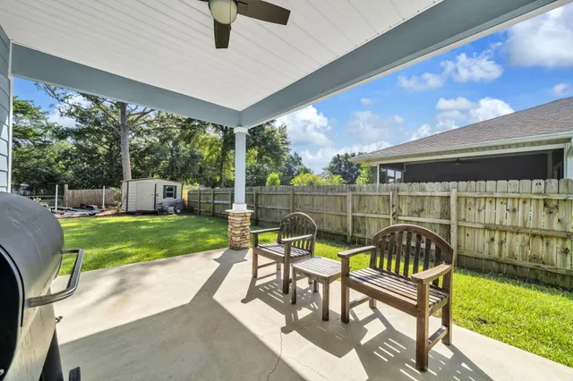 a bathroom with a toilet a sink and a mirror