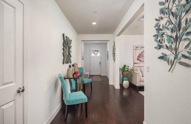 a bedroom with a bed and a table