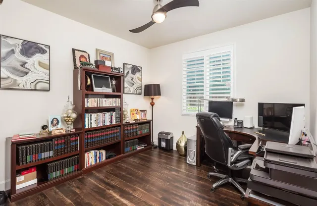 a bedroom with furniture and a window