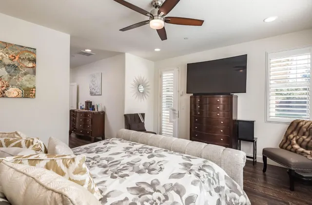 a bathroom with a bathtub and a sink