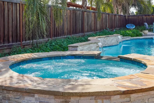 a view of a backyard with a garden