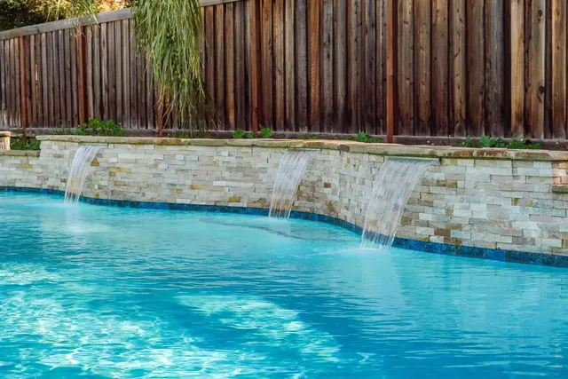 a view of a swimming pool with a patio