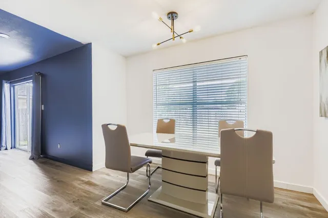 a view of workspace with furniture and window