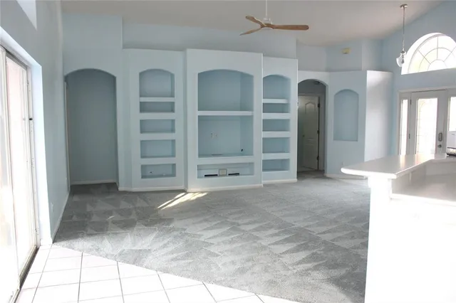 a view of a room that has a window in it