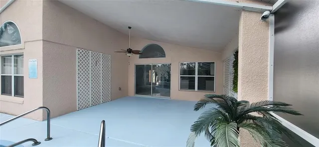 a view of a livingroom with furniture and front door