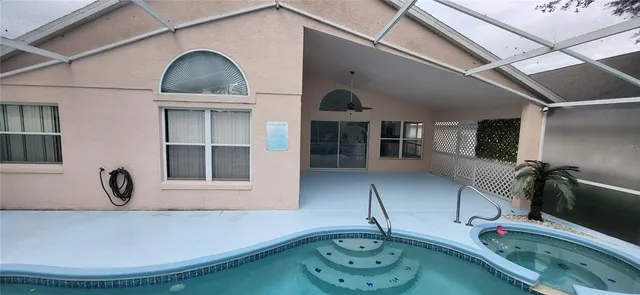 a kitchen with a sink and a refrigerator