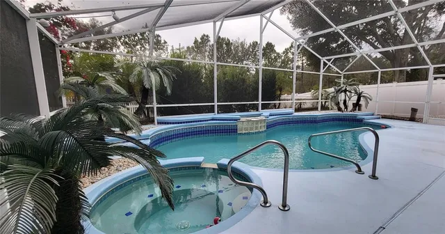 a kitchen with a sink cabinets and window