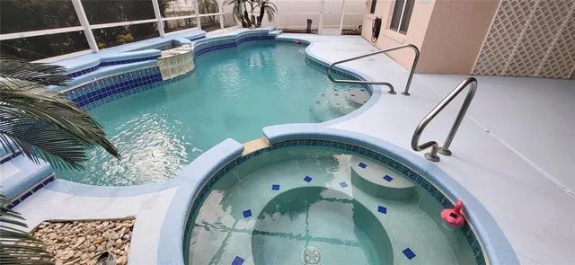 a kitchen with stainless steel appliances a refrigerator stove and microwave