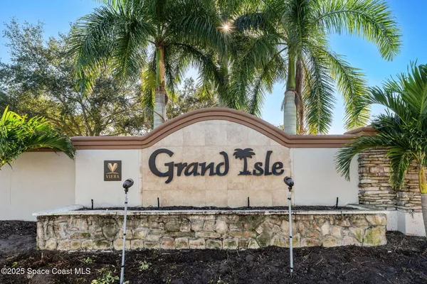 a view of a swimming pool with an ocean view