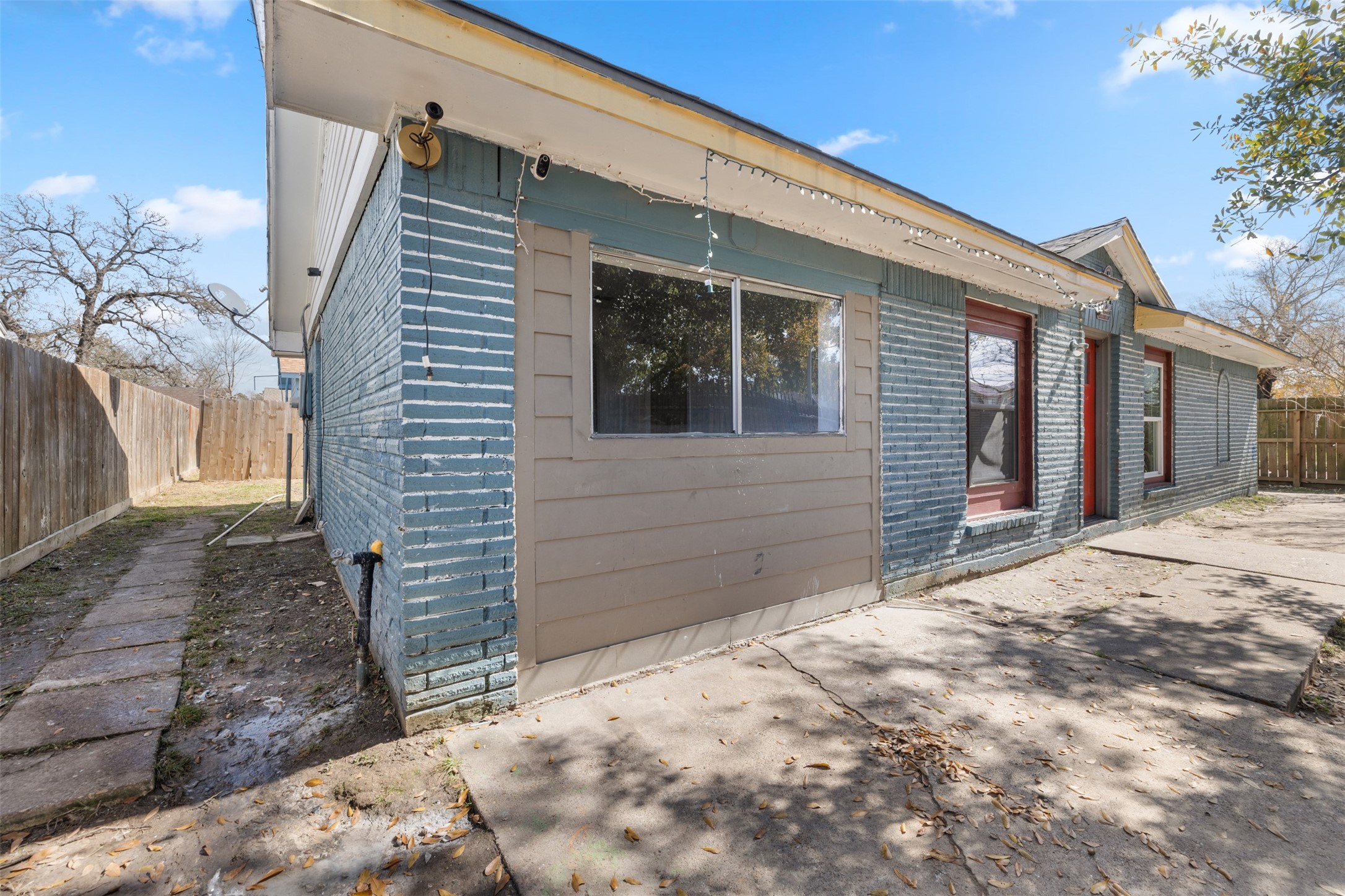 9802 Lum Lane Houston, TX 77078 - Photo 22 of 45 Another entry view from Main home looking into left side of the home with stone steps leading to the door to washer/dryer room